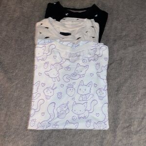 Lot of 3 All over print t-shirts size medium, birds,dinosaurs, cats